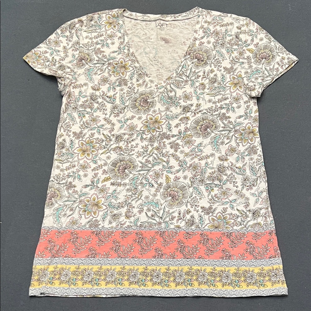 So cute, V neck, white with peach, yellow, green. Thin fabric.